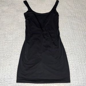 Super cute low back cut dress with ruffle detail